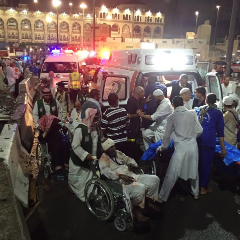 Paramedics and officials hospitalize wounded people after a construction crane collapsed over the Muslim pilgrims around the Muslims' holy place Kaaba in Mecca, Saudi Arabia on Sep. 11, 2015. (Photo by Ozkan Bilgin/Anadolu Agency/Getty)