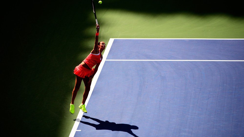 Roberta Vinci of Italy serves to Serena Williams of the United States during their Women's Singles Semifinals match on Day Twelve of the 2015 US Open on September 11, 2015. (Photo by Alex Goodlett/Getty)