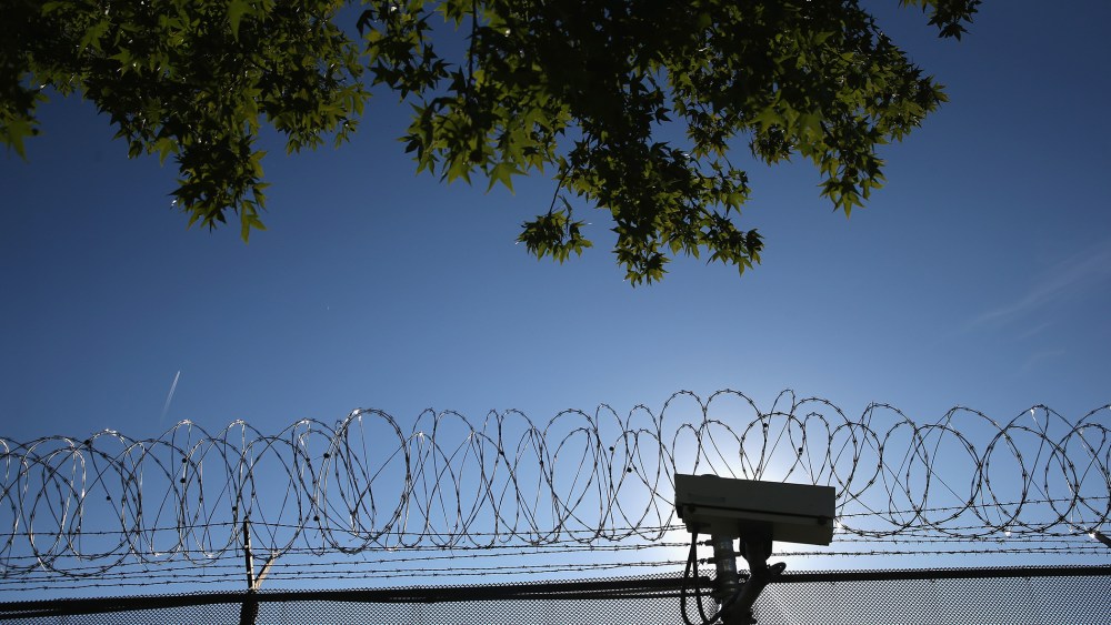 Concertina wire and a security camera line the perimeter of the York County Dentention Center, Sept. 15, 2015 in York, Penn. (Photo by John Moore/Getty)