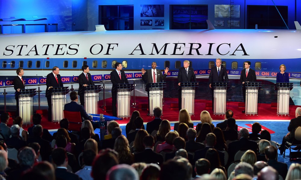Republican presidential hopefuls listen as retired neurosurgeon Ben Carson (C) speaks during the Presidential debate at the Ronald Reagan Presidential Library in Simi Valley, Calif., on Sept. 16, 2015. (Photo by Frederic J. Brown/AFP/Getty)