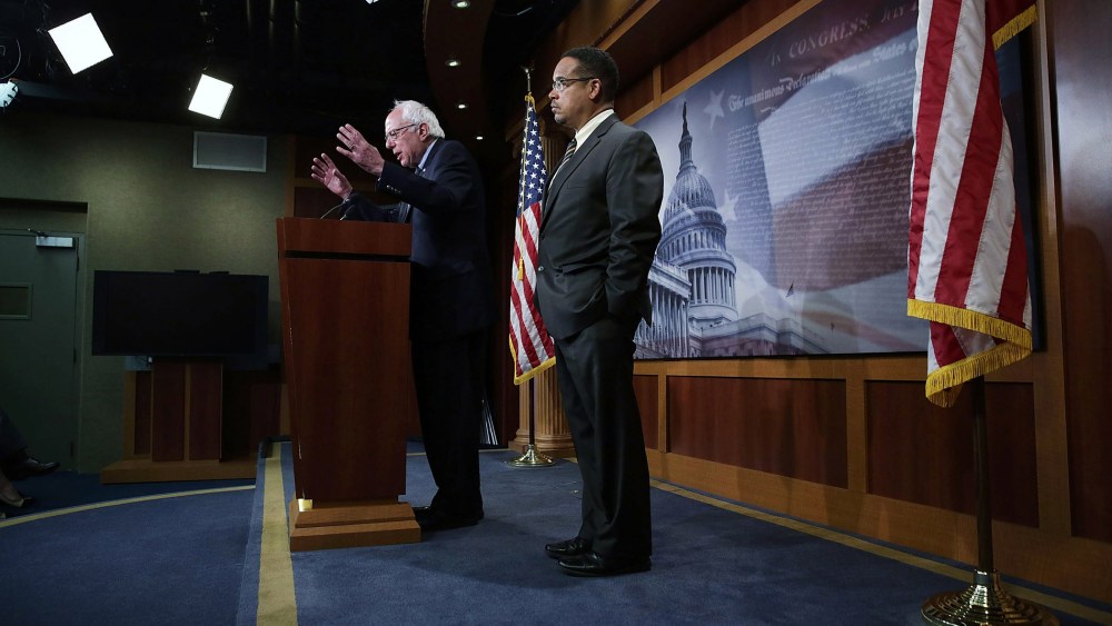 U.S. Sen. Bernie Sanders and Rep. Keith Ellison speak during a news conference about private prisons, Sep. 17, 2015 on Capitol Hill. The legislators announced that they will introduce bills to ban private prisons. (Photo by Alex Wong/Getty)