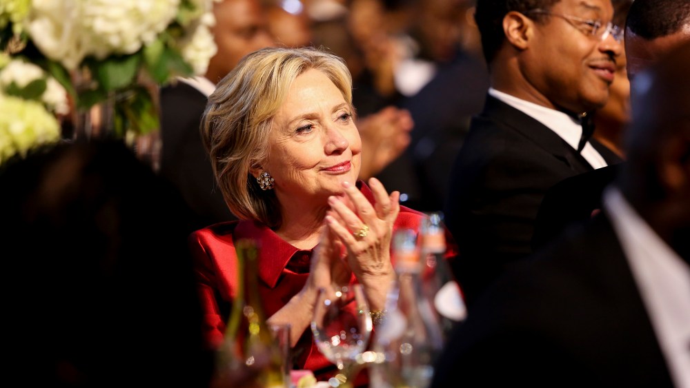 Democratic presidential candidate Hillary Clinton applauds a speaker at the Congressional Black Caucus Foundation's 45th Annual Legislative Conference Phoenix Awards Dinner, Sept. 19, 2015 in Washington, DC. (Photo by Aude Guerrucci/Pool/Getty)