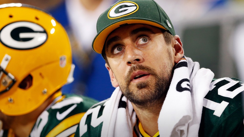 Aaron Rodgers, #12 of the Green Bay Packers, looks on from the bench during a game at Lambeau Field on Sept. 20, 2015 in Green Bay, Wis. (Photo by Christian Petersen/Getty)