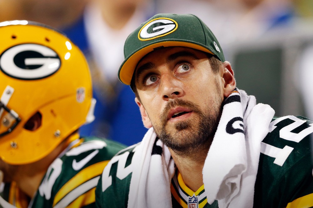 Aaron Rodgers, #12 of the Green Bay Packers, looks on from the bench during a game at Lambeau Field on Sept. 20, 2015 in Green Bay, Wis. (Photo by Christian Petersen/Getty)
