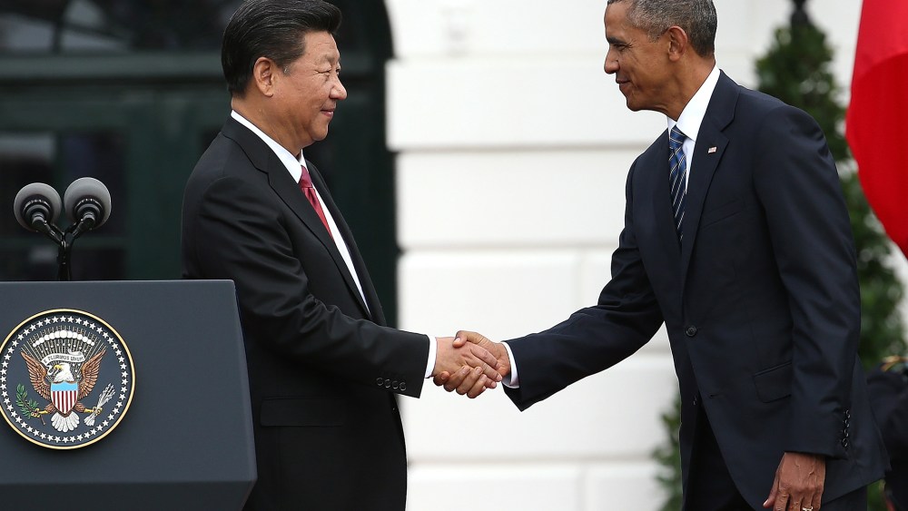 U.S. President Barack Obama shakes hands with Chinese President Xi Jinping on the south lawn of the White House grounds Sept. 25, 2015 in Washington, DC. (Photo by Win McNamee/Getty)
