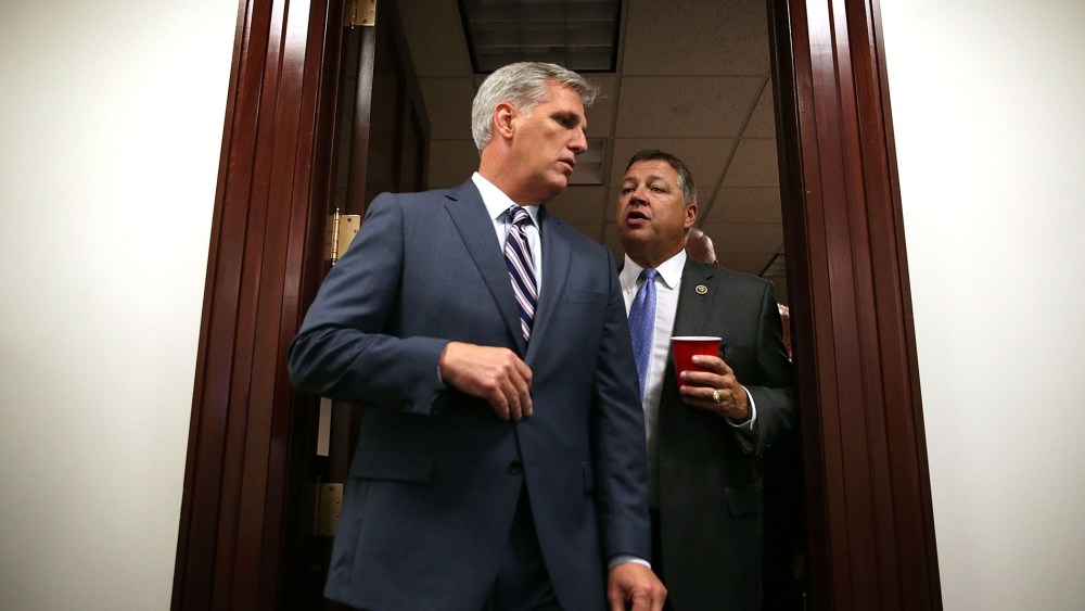 House Majority Leader Rep. Kevin McCarthy (R-CA) (L) talks to Rep. Bill Shuster (R-PA) (R) as they come out after a House Republican Conference meeting on Sept. 29, 2015 at the U.S. Capitol in Washington, D.C. (Photo by Alex Wong/Getty)