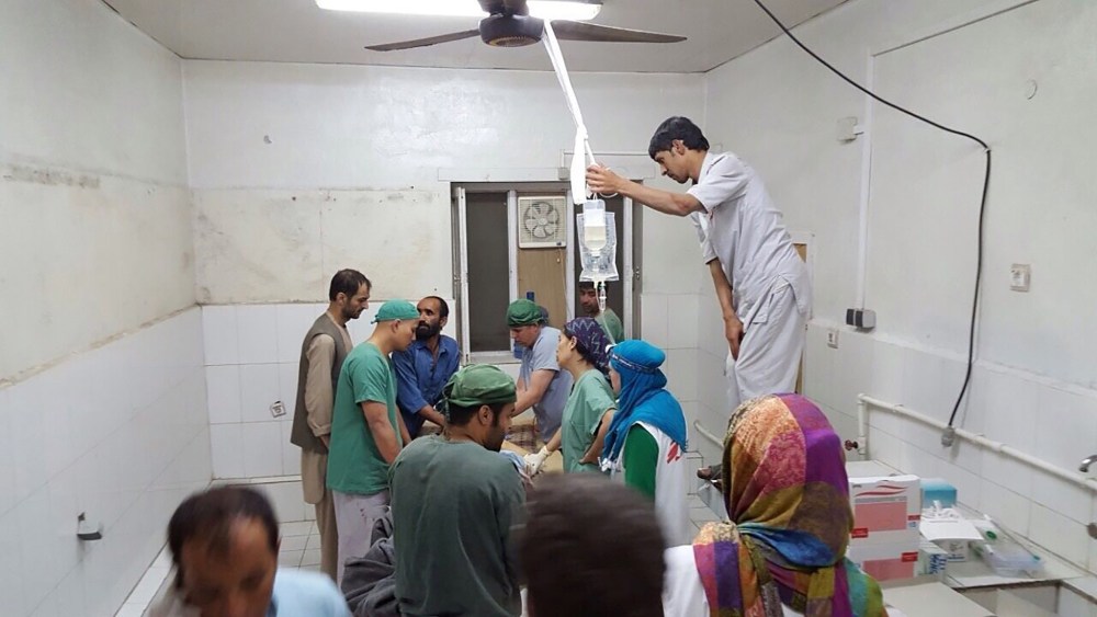 Doctors Without Borders (MSF) staff are seen during a surgery after a U.S. airstrike on MSF hospital in Kunduz, Afghanistan on Oct. 03, 2015. (Photo by MSF/Pool/Anadolu Agency/Getty)