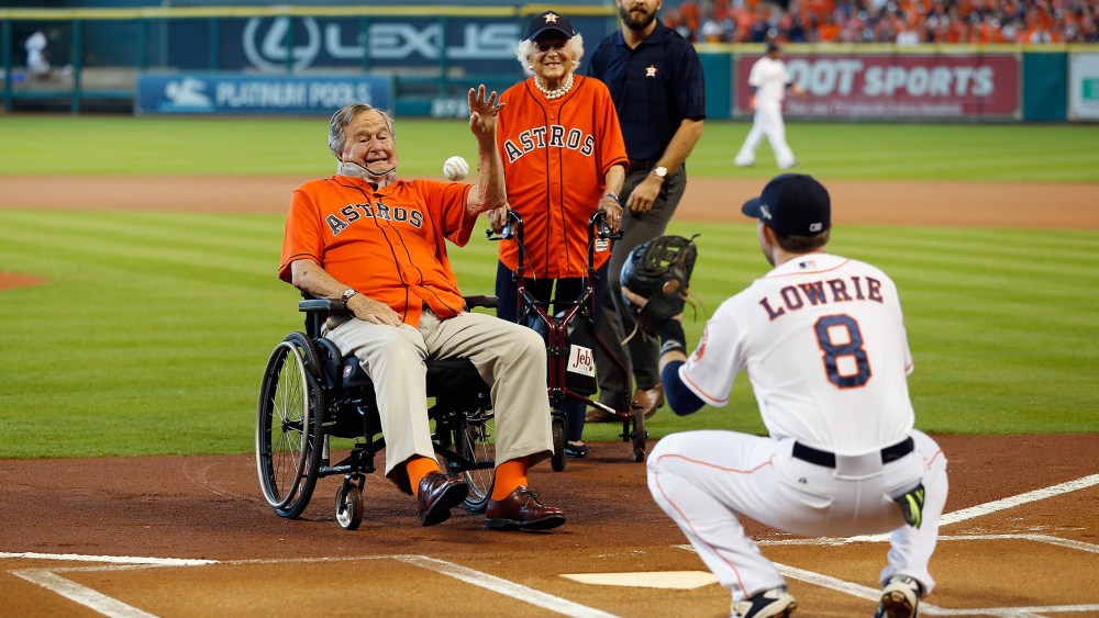Former President George H.W. Bush throws out the ceremonial first pitch to Jed Lowrie #8 of the Houston Astros prior to game three of the American League Division Series, Oct. 11, 2015 in Houston, Texas. (Photo by Bob Levey/Getty)