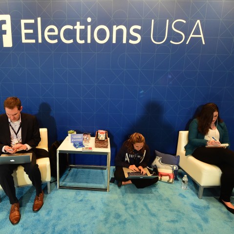 Journalists in the Facebook section take notes ahead of the Democratic presidential debate at the Wynn Hotel in Las Vegas, Nev., on Oct. 13, 2015, hours before the first Democratic Presidential Debate. (Photo by Frederick J. Brown/AFP/Getty)