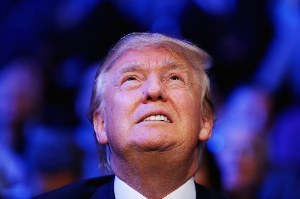 Presidential candidate Donald Trump gazes up during a boxing match at Madison Square Garden on Oct. 17, 2015 in New York City. (Photo by Al Bello/Getty)