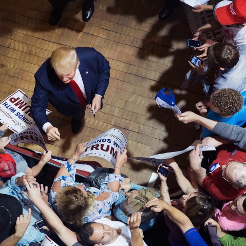 Republican presidential candidate Donald Trump greets guests after speaking at a campaign rally at Burlington Memorial Auditorium on Oct. 21, 2015 in Burlington, Iowa. (Photo by Scott Olson/Getty)