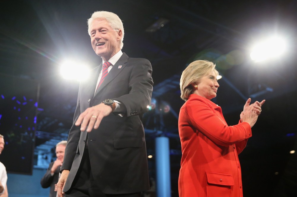 Democratic presidential candidate Hillary Clinton and her husband former president Bill Clinton greet guests at the end of the Jefferson-Jackson Dinner on Oct. 24, 2015 in Des Moines, Iowa. (Photo by Scott Olson/Getty)