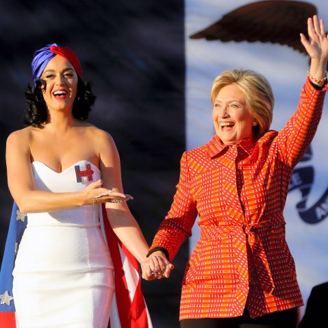 Singer Katy Perry and Democratic presidential candidate Hillary Clinton wave to supporters outside the Iowa Events Center before the start of the Jefferson-Jackson dinner on Oct. 24, 2015 in Des Moines, Ia. (Photo by The Asahi Shimbun/Getty)