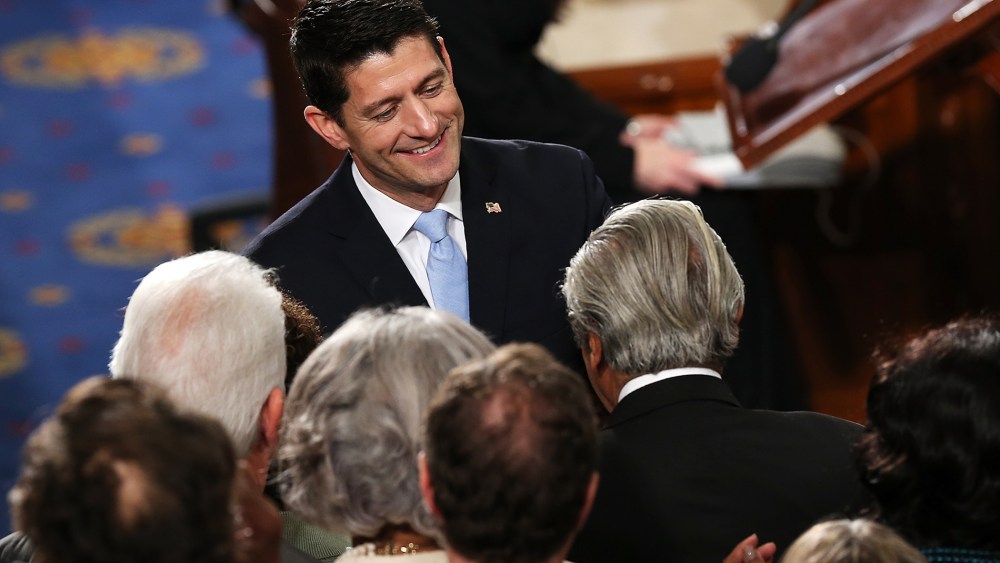 Speaker of the House Paul Ryan (R-WI) is congratulated by fellow members of the U.S. House of Representatives on the floor of the House chamber, Oct. 29, 2015 in Washington, DC. (Photo by Win McNamee/Getty)