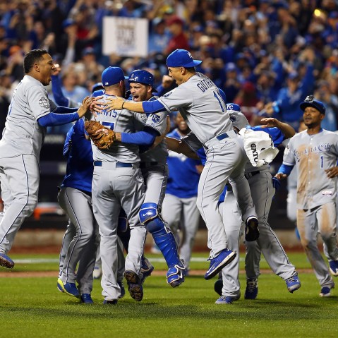 The Kansas City Royals celebrate defeating the New York Mets to win Game Five of the 2015 World Series at Citi Field on Nov. 1, 2015 in the Flushing neighborhood of the Queens borough of New York, N.Y. (Photo by Elsa/Getty)