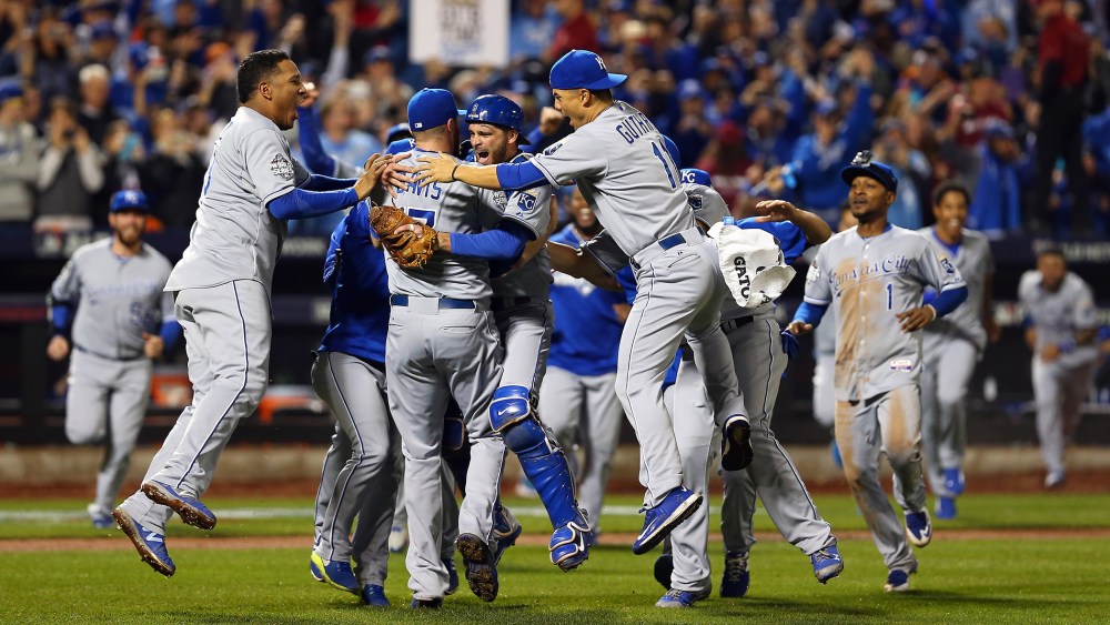 The Kansas City Royals celebrate defeating the New York Mets to win Game Five of the 2015 World Series at Citi Field on Nov. 1, 2015 in the Flushing neighborhood of the Queens borough of New York, N.Y. (Photo by Elsa/Getty)