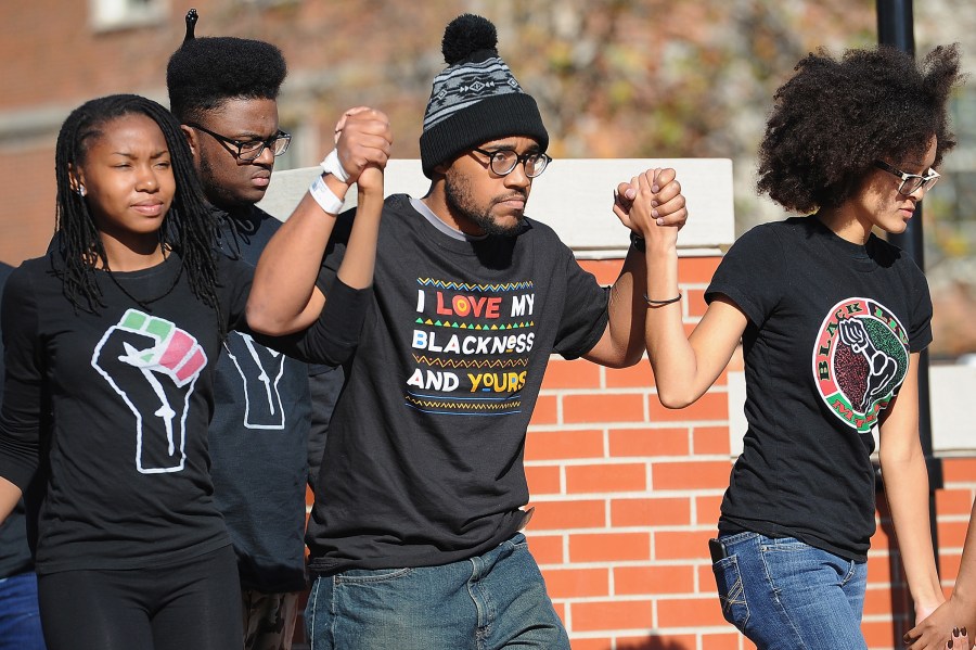 Jonathan Butler, a University of Missouri grad student who did a 7 day hunger strike is greeted students on the campus of University of Missouri as they celebrate the resignation of President Tim Wolfe, Nov. 9, 2015. (Photo by Michael B. Thomas/Getty)