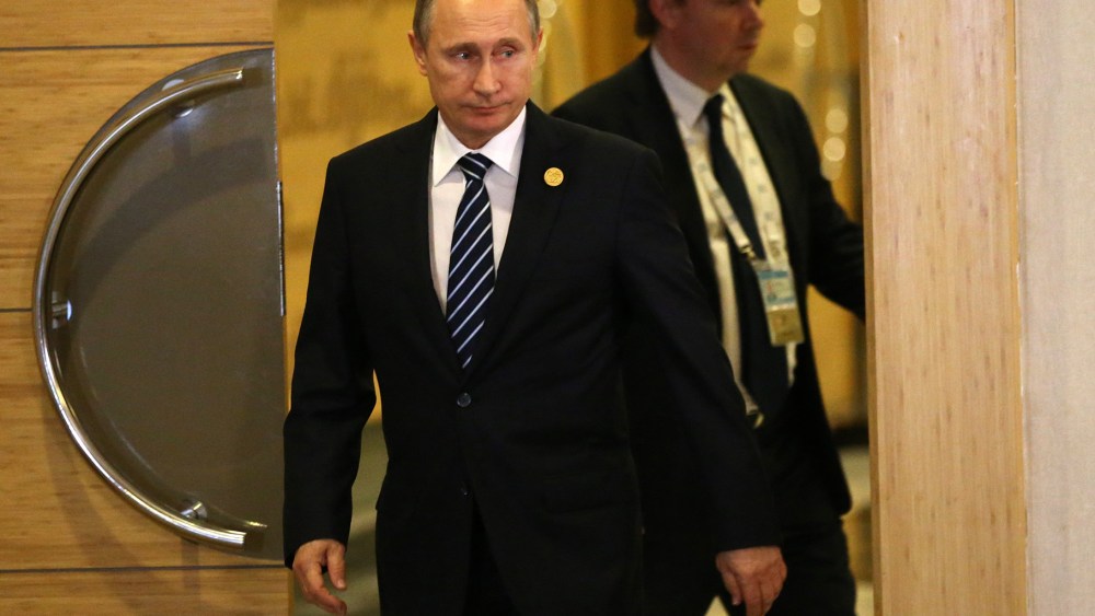 Russian President Vladimir Putin arrives to make a speech following the G20 Antalya Summit on Nov. 16, 2015 in Antalya, Turkey. (Photo by Sasha Mordovets/Getty)