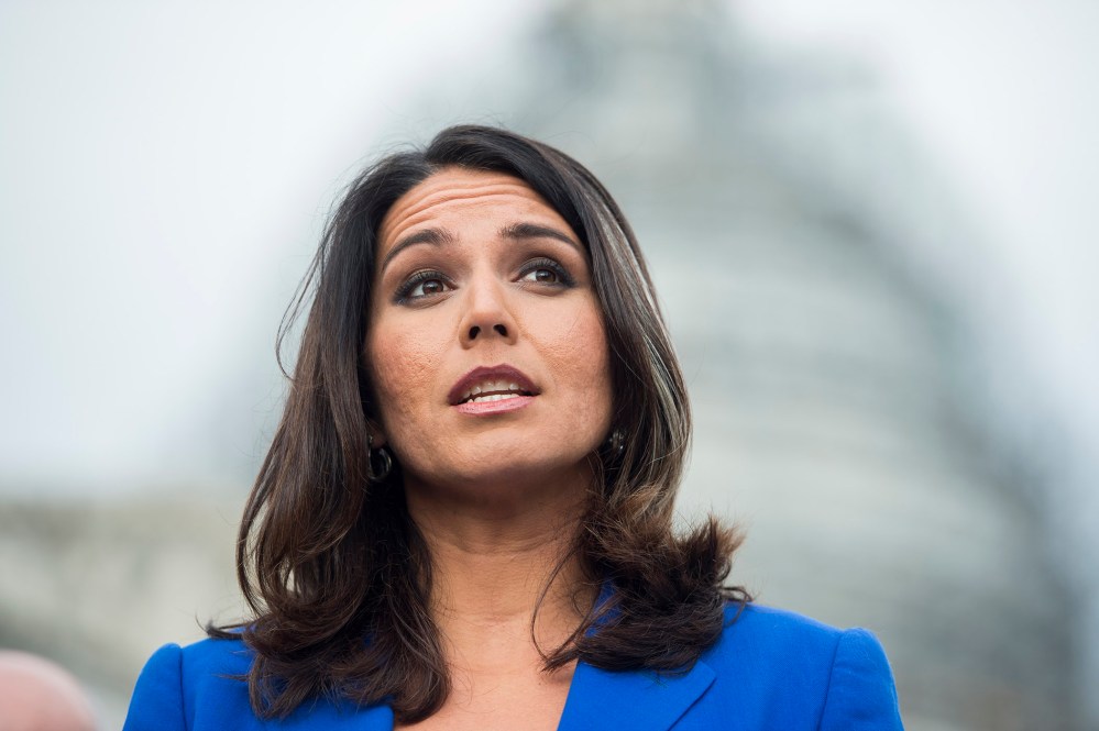 Rep. Tulsi Gabbard, D-Hawaii, speaks during a news conference on the Trans-Pacific Partnership outside of the U.S. Capitol, Nov. 18, 2015. (Photo By Bill Clark/CQ Roll Call/Getty)