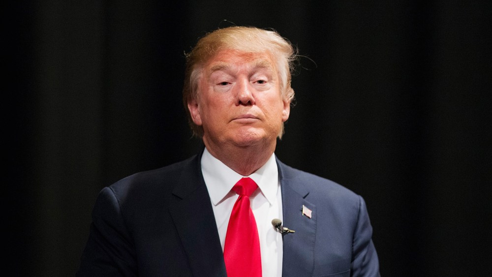 Republican presidential candidate Donald Trump speaks to guests following a town hall meeting at Des Moines Area Community College Newton Campus on Nov. 19, 2015 in Newton, Iowa. (Photo by Scott Olson/Getty)