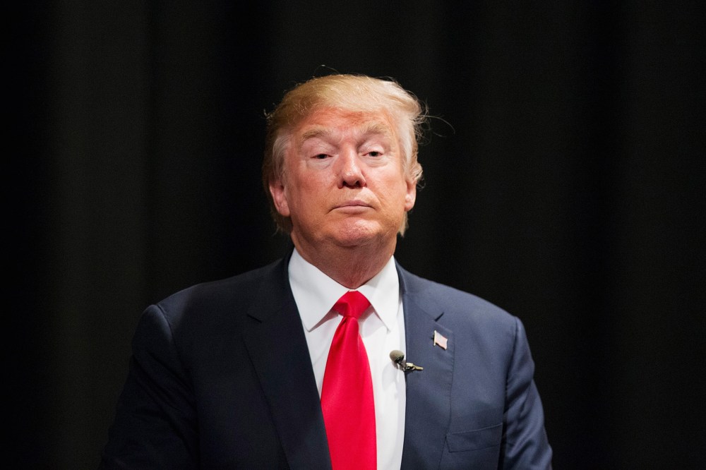 Republican presidential candidate Donald Trump speaks to guests following a town hall meeting at Des Moines Area Community College Newton Campus on Nov. 19, 2015 in Newton, Iowa. (Photo by Scott Olson/Getty)