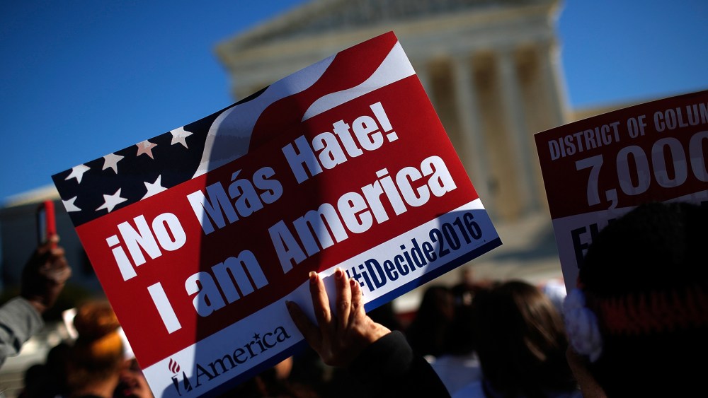 Supporters of immigration reform protest outside the U.S. Supreme Court on Nov. 20, 2015 in Washington, DC. (Photo by Win McNamee/Getty)