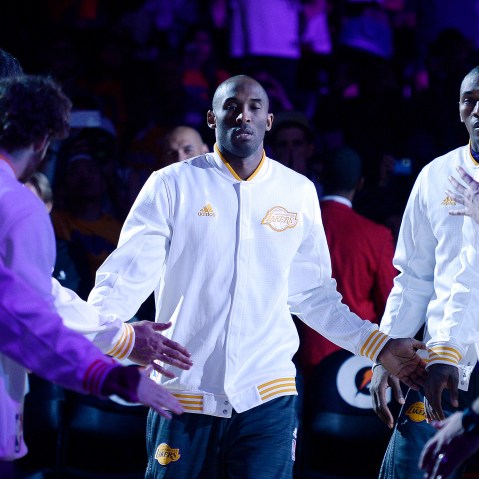 Kobe Bryant, of the Los Angeles Lakers, is introduced at start of the basketball game against the Portland Trail Blazers at Staples Center, Nov. 22, 2015 in Los Angeles, Calif. (Photo by Kevork Djansezian/Getty)