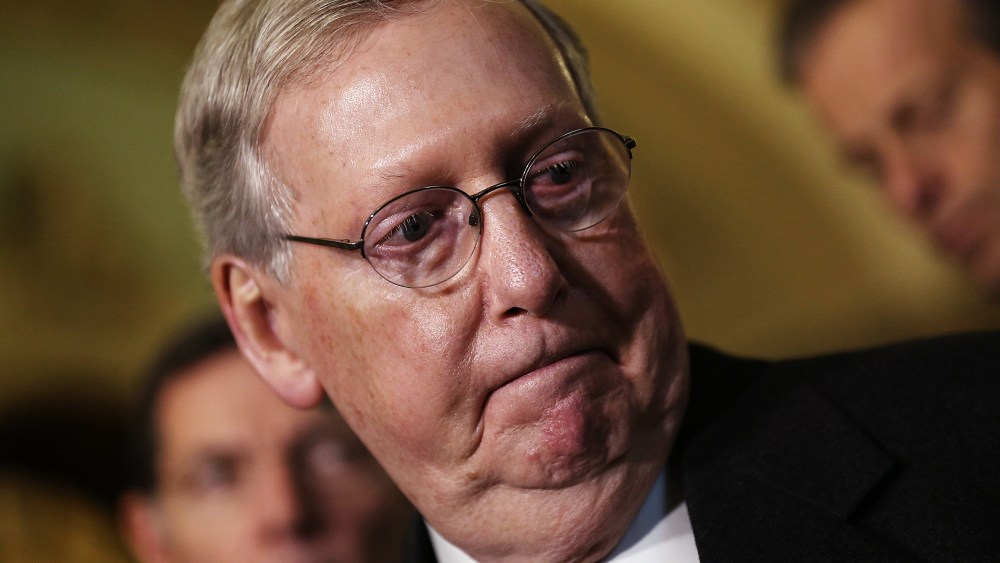 Senate Majority Leader Mitch McConnell (R-KY) listens to a question during a press conference following the weekly policy meeting at the U.S. Capitol Dec. 1, 2015 in Washington, DC. (Photo by Win McNamee/Getty)