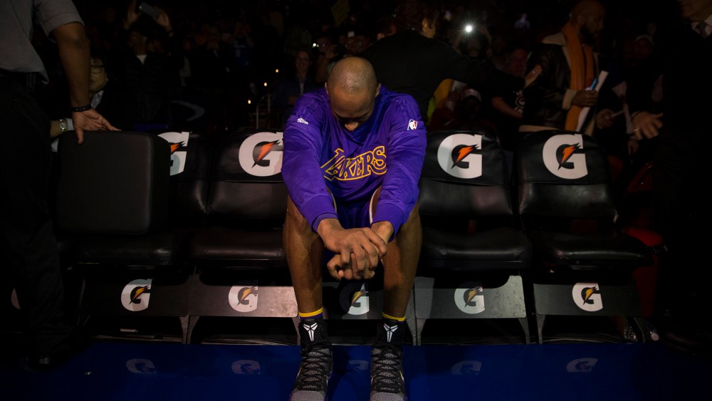 Kobe Bryant of the Los Angeles Lakers sits on the bench prior to the game against the Philadelphia 76ers on Dec. 1, 2015 at the Wells Fargo Center in Philadelphia, Penn. (Photo by Mitchell Leff/Getty)