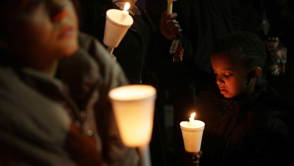 People participate in a candlelight vigil, held by the Council on American-Islamic Relations, for the victims in recent mass shootings Dec. 4, 2015 at the Muslin Community Center in Silver Spring, Md. (Photo by Alex Wong/Getty)