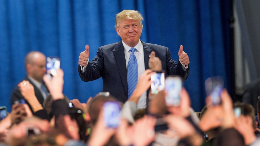 Republican presidential candidate Donald Trump arrives for a campaign event at Mississippi Valley Fairgrounds on Dec. 5, 2015 in Davenport, Ia. (Photo by Scott Olson/Getty)