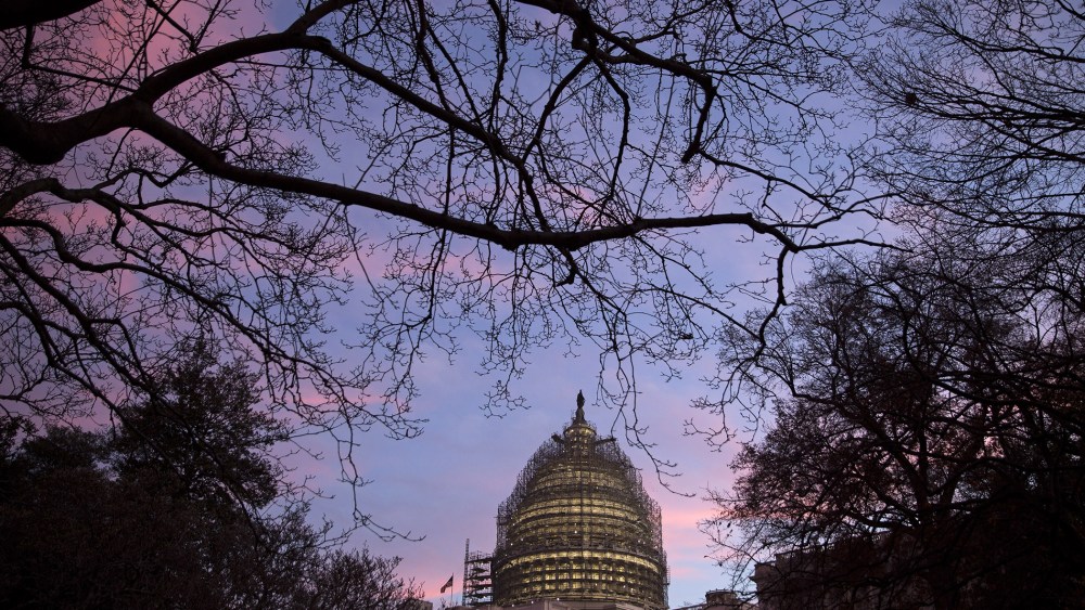 The U.S. Capitol building stands at daybreak in Washington, D.C., on Dec. 11, 2015. (Photo by Drew Angerer/Bloomberg/Getty)