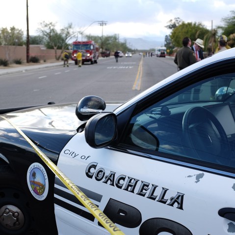 A police car is parked near the Islamic Society of Palm Springs in Coachella, California on Dec. 11, 2015, after the area was sealed off when a fire broke out at the mosque. (Photo by Guillaume Meyer/AFP/Getty)