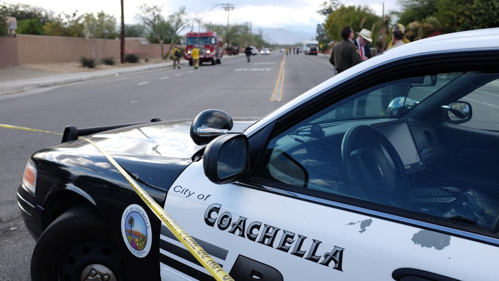 A police car is parked near the Islamic Society of Palm Springs in Coachella, California on Dec. 11, 2015, after the area was sealed off when a fire broke out at the mosque. (Photo by Guillaume Meyer/AFP/Getty)