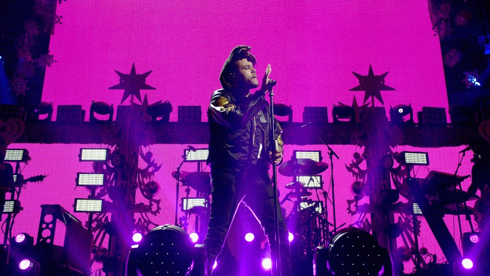 Musician The Weeknd performs onstage during Z100's Jingle Ball 2015 at Madison Square Garden on Dec. 11, 2015 in New York City. (Photo by Dimitrios Kambouris/Getty)