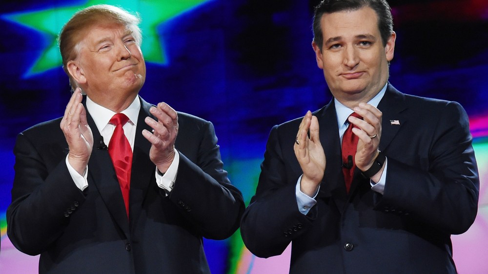Republican presidential candidates Donald Trump and Sen. Ted Cruz applaud as they are introduced during the CNN presidential debate at The Venetian Las Vegas on Dec. 15, 2015 in Las Vegas, Nev. (Photo by Ethan Miller/Getty)