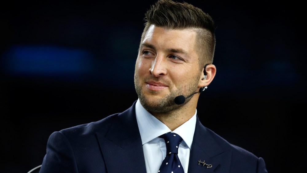 Tim Tebow speaks on air before the Goodyear Cotton Bowl at AT&T Stadium on December 31, 2015 in Arlington, Texas. (Photo by Scott Halleran/Getty)