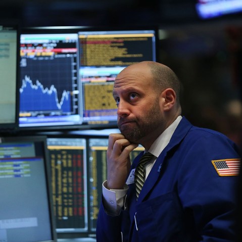 Traders work on the floor of the New York Stock Exchange (NYSE) on Jan. 7, 2016 in New York City. (Photo by Spencer Platt/Getty)
