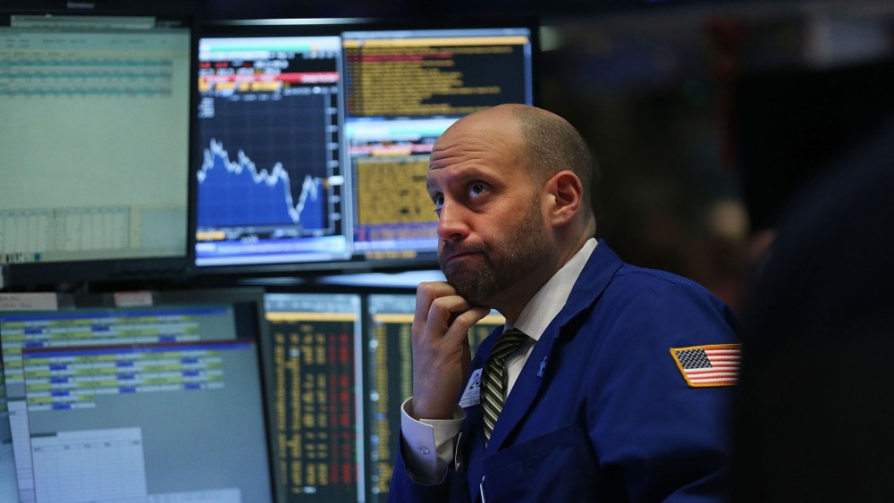 Traders work on the floor of the New York Stock Exchange (NYSE) on Jan. 7, 2016 in New York City. (Photo by Spencer Platt/Getty)