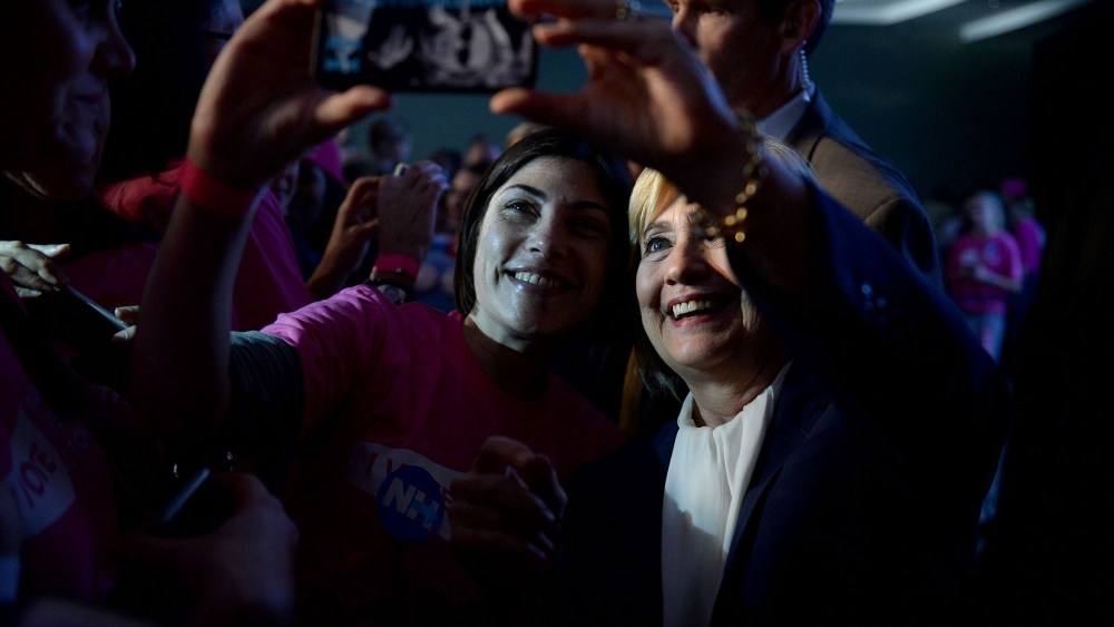 Democratic Presidential candidate Hillary Clinton takes a selfie with a supporter after receiving an endorsement from Planned Parenthood Action Fund, Jan. 10, 2016 in Hooksett, N.H. (Photo by Darren McCollester/Getty)