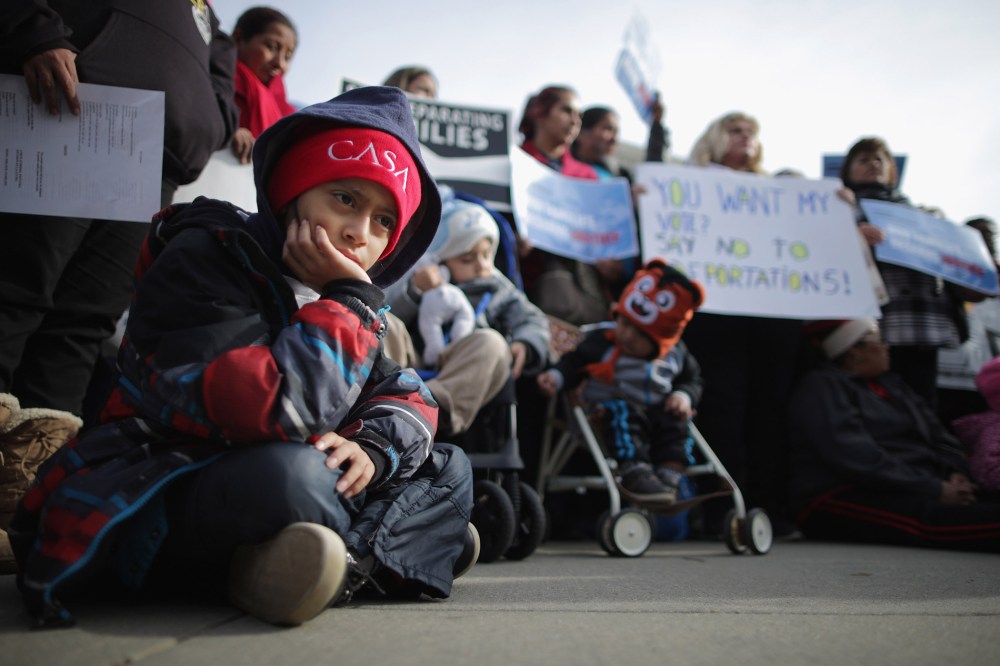 About fifty pro-immigration reform demonstrators gathered for a rally outside the United States Supreme Court Jan. 15, 2016 in Washington, DC. (Photo by Chip Somodevilla/Getty)