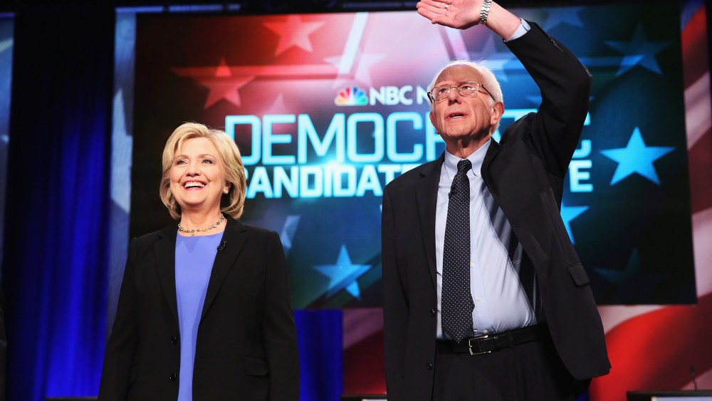 Candidates Hillary Clinton and Senator Bernie Sanders (I-VT) participate in the Democratic Candidates Debate hosted by NBC News and YouTube on Jan. 17, 2016 in Charleston, S.C. (Photo by Andrew Burton/Getty)