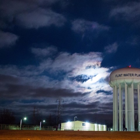 The City of Flint Water Plant is illuminated by moonlight on Jan. 23, 2016 in Flint, Mich. (Photo by Brett Carlsen/Getty)