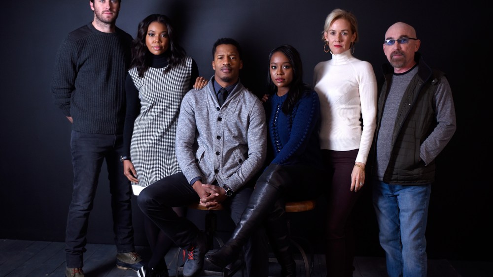 (L-R) Actors Armie Hammer, Gabrielle Union, Nate Parker, Aja Naomi King, Penelope Ann Miller and Jackie Earle Haley from the film "The Birth of a Nation" poses for a portrait on Jan. 25, 2016 in Park City, Utah. (Photo by Jeff Vespa/WireImage/Getty)