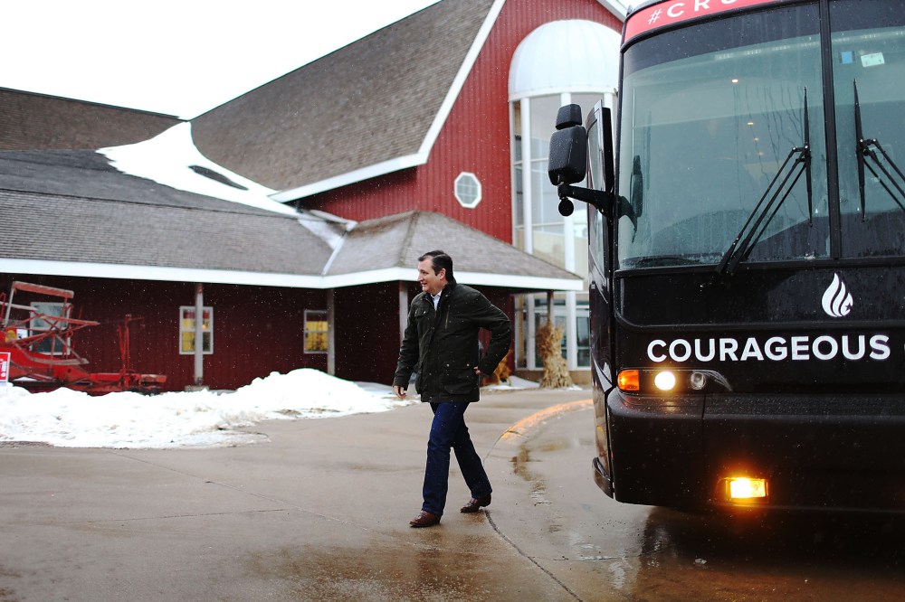 Republican presidential candidate Sen. Ted Cruz (R-TX) walks off his campaign bus for an event at the Heartland Acres Agribition Center on Jan. 25, 2016 in Independence, Iowa. (Photo by Joe Raedle/Getty)