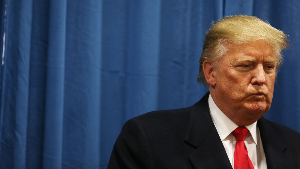 Republican presidential candidate Donald Trump waits to be introduced during a campaign event at the University of Iowa on Jan. 26, 2016 in Iowa City, Iowa. (Photo by Joe Raedle/Getty)