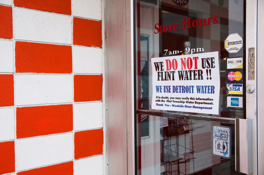 A sign at a local restaurant reassures customers that they are not on Flint water but on uncontaminated water pulled from Detroit on Jan. 27, 2016 at Westside Diner in Flint, Mich. (Photo by Brett Carlsen/Getty)