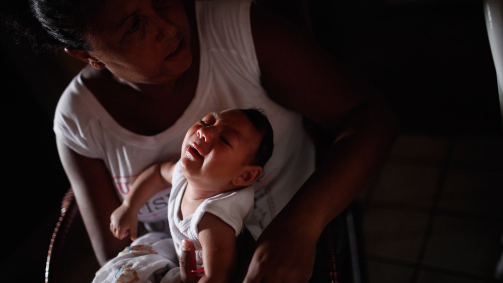 Alice Vitoria Gomes Bezerra, a 3-months-old with microcephaly, and mother Nadja Cristina Gomes Bezerra, Jan. 31, 2016 in Recife, Brazil. There are an estimated 4,000 infants with microcephaly related to Zika virus in Brazil. (Photo by Mario Tama/Getty)