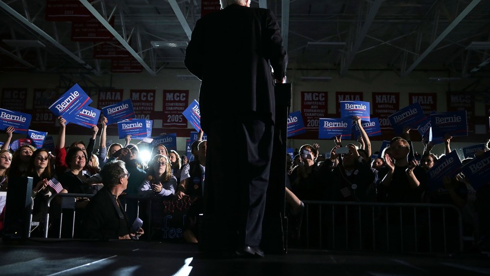 Supporters react as Democratic presidential candidate Sen. Bernie Sanders (I-VT) speaks during a campaign event at Grand View University Jan. 31, 2016 in Des Moines, Iowa. (Photo by Alex Wong/Getty)