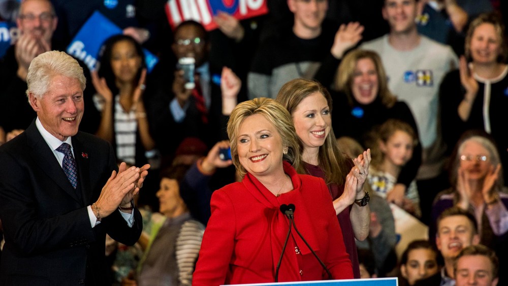 Former Secretary of State Hillary Clinton, with her husband former President Bill Clinton and daughter Chelsea Clinton, Feb. 1, 2016. (Photo by Melina Mara/The Washington Post/Getty)